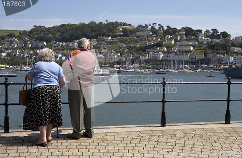 Image of elderly couple looking towards kingswear