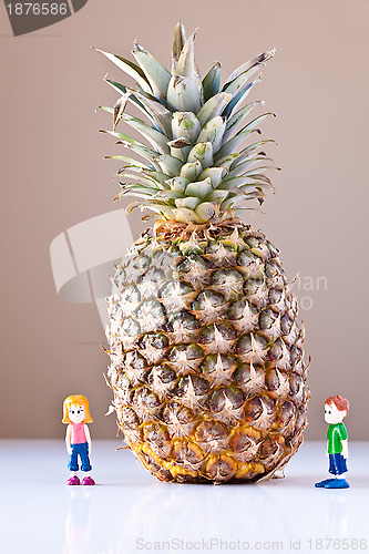 Image of Girl and Boy Overwhelmed by Nutrition Choices (Pineapple)