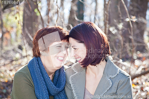 Image of Portrait of Laughing Adult Mother and Daughter