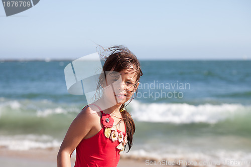 Image of Puzzled Little Girl on the Beach