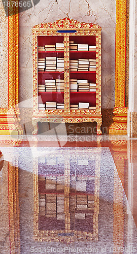 Image of Decorated case with books for meditation.