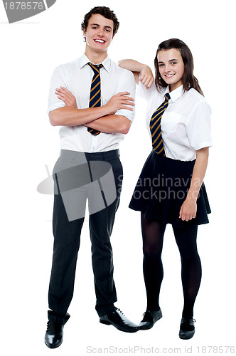 Image of School girl resting hand on her classmates shoulder