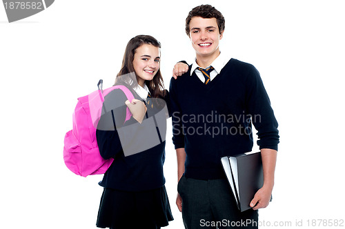 Image of Girl resting her arm on classmates shoulder