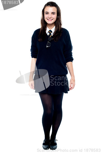 Image of Full length portrait of pretty girl in school uniform