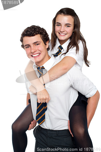 Image of Cheerful shot of youngster riding piggyback