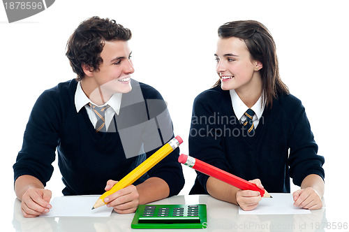 Image of Classmates discussing the correct answer