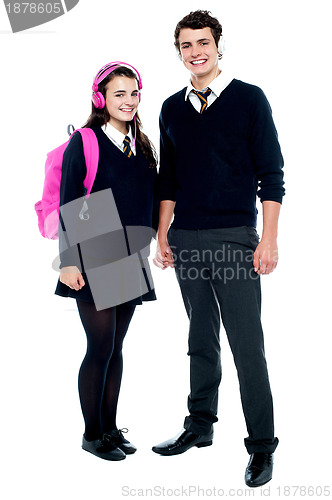 Image of School friends with headphones on enjoying music