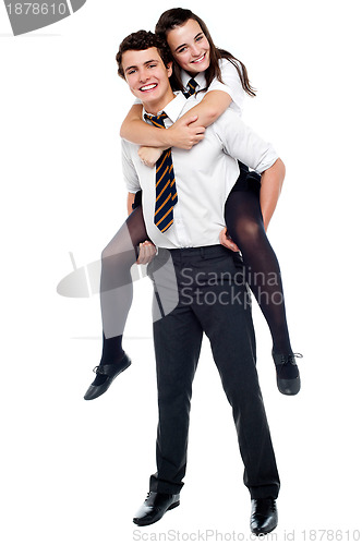 Image of Best friends having fun together, Girl enjoying piggy ride