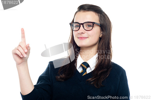 Image of Smart girl draws the attention of teacher