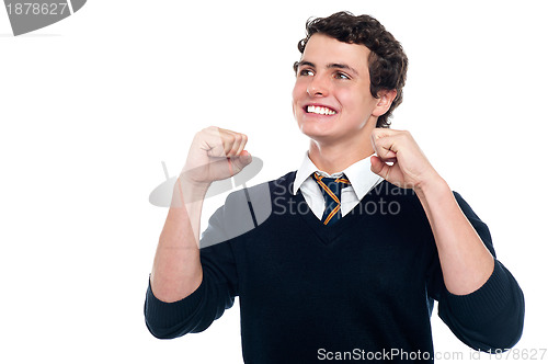 Image of Successful young teenager celebrating