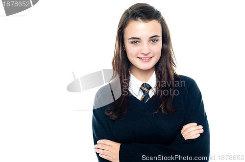 Image of Confident young school child in uniform