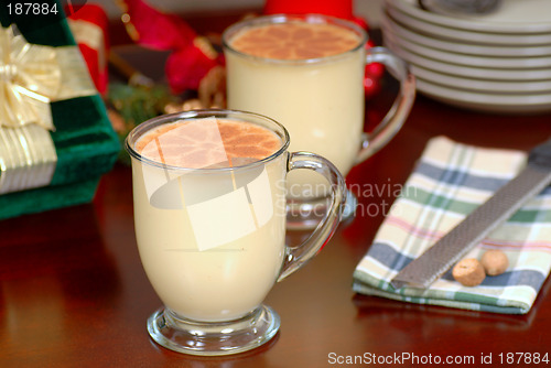 Image of Two glasses of rich eggnog in a holiday table setting