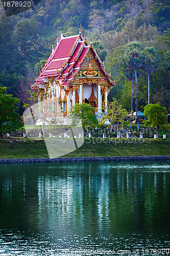 Image of Buddhist temple on near the pond - Thailand.