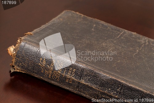 Image of Close up view of a very old family bible resting on table