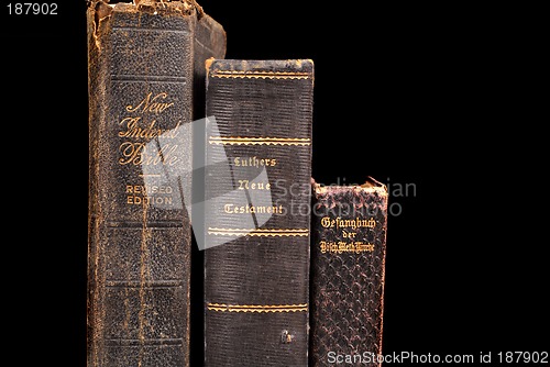 Image of Three very old bibles including two German bibles