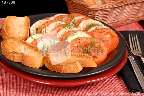 Image of A fennel and tomato salad with crostini