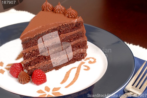 Image of Delicious 4 layer chocolate cake with raspberries