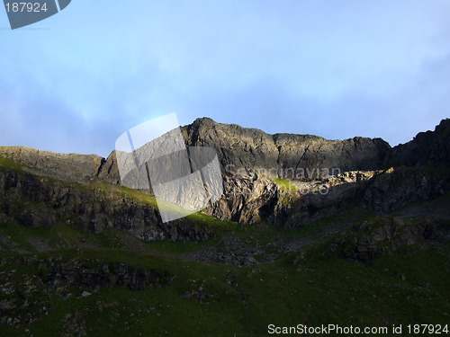 Image of Sunny patch on a dark mountain