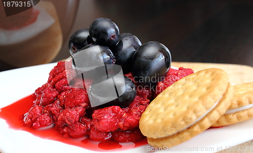 Image of dessert of raspberry and grapes