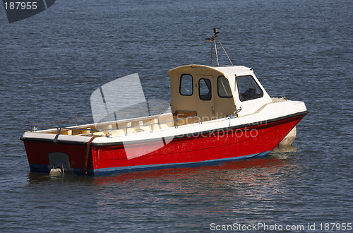 Image of small wooden motor boat