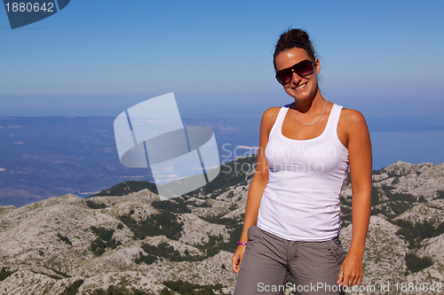 Image of Smiling girl with panorama