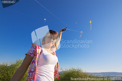 Image of Smiling girl with kite