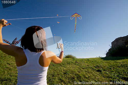 Image of Girl with flying kite