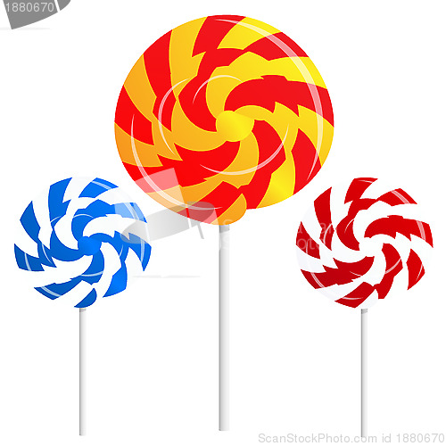 Image of round shape lollipops on white background