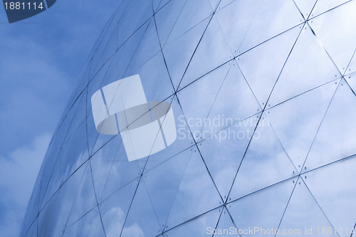 Image of sky reflecting in building