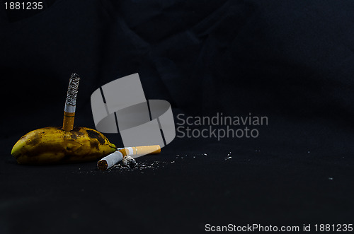 Image of Rotten Banana with Cigarette