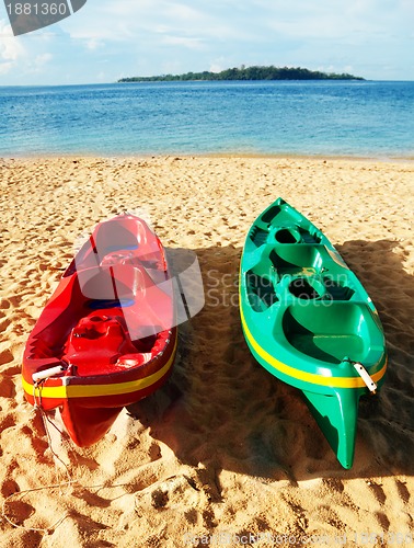 Image of Couple kayaks on the shore