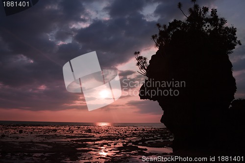 Image of sunset horizon with cliff silhouette