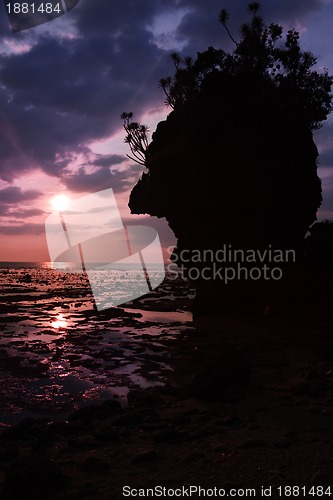 Image of beautiful sunset sky with cliff silouette