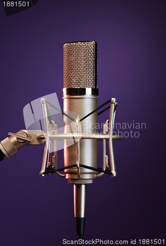 Image of shiny metallic mic on stand