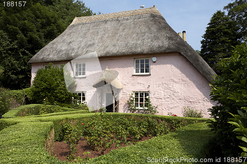 Image of traditional pink painted english cottage