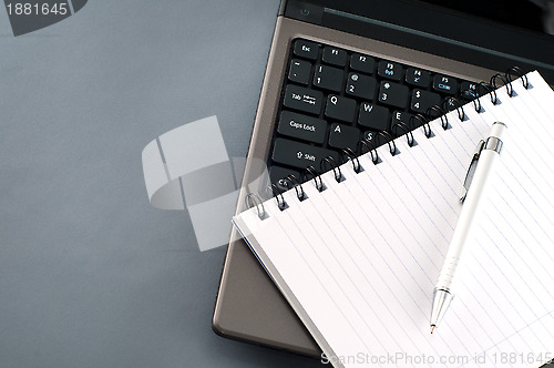 Image of Notebook and pen