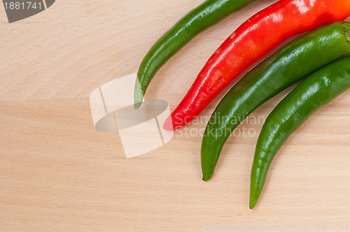 Image of Green and red hot pepper