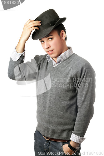 Image of Young attractive man wearing black hat