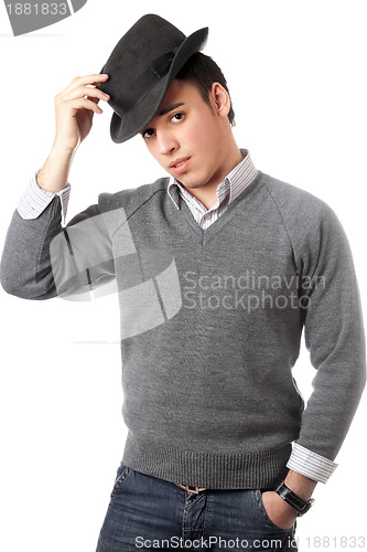 Image of Young handsome man wearing black hat