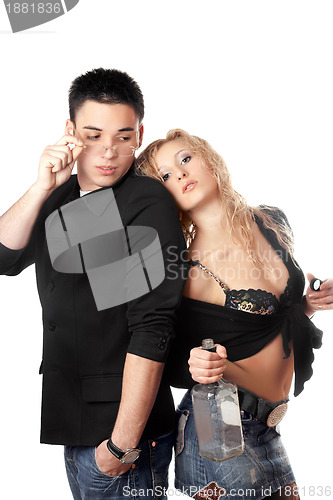 Image of Serious young man and playful young woman