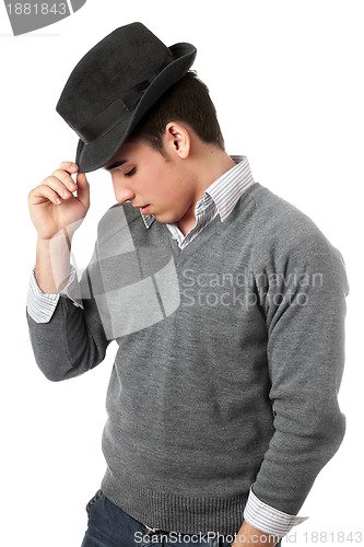 Image of Handsome young man wearing black hat. Isolated