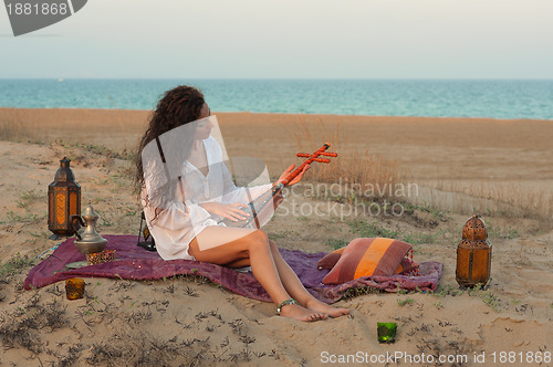 Image of Woman on a dune