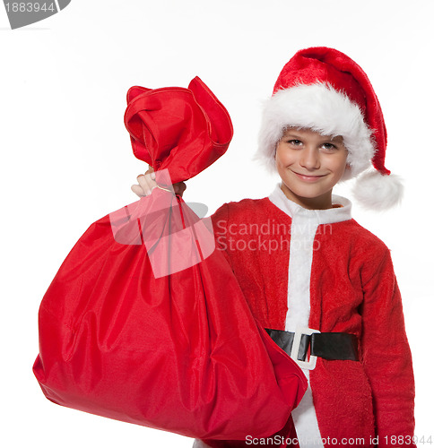 Image of Boy holding a sack