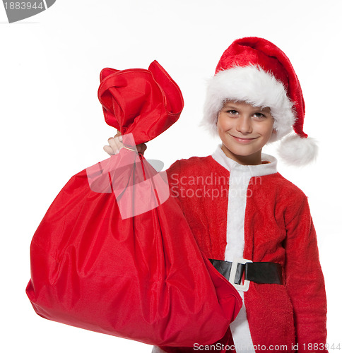 Image of Boy holding a sack