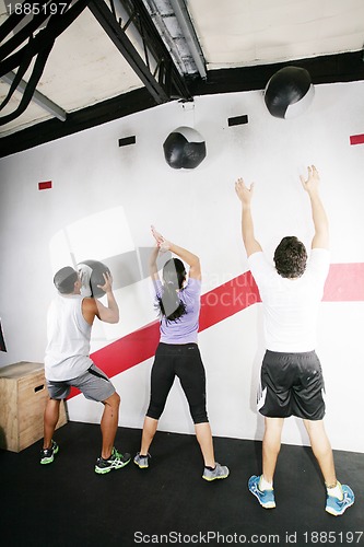Image of Man and Woman Doing Crossfit on gym. Crossfit Series