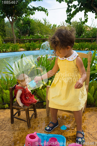 Image of Tea for her doll