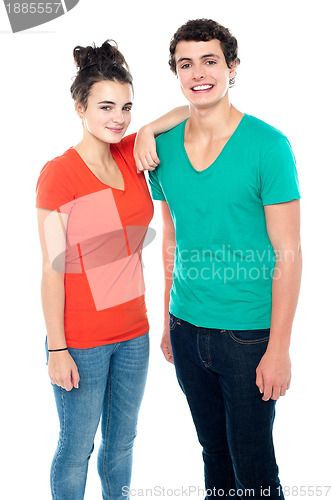 Image of Adorable teenage couple in casuals