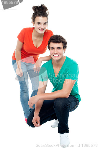 Image of Trendy girl posing with her boyfriend