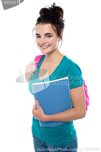 Image of Pretty teenager ready to attend college