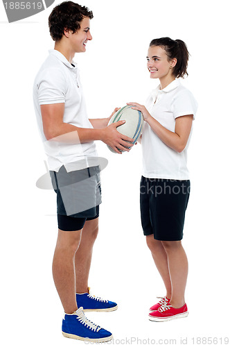 Image of Full length portrait of sporty guy and girl